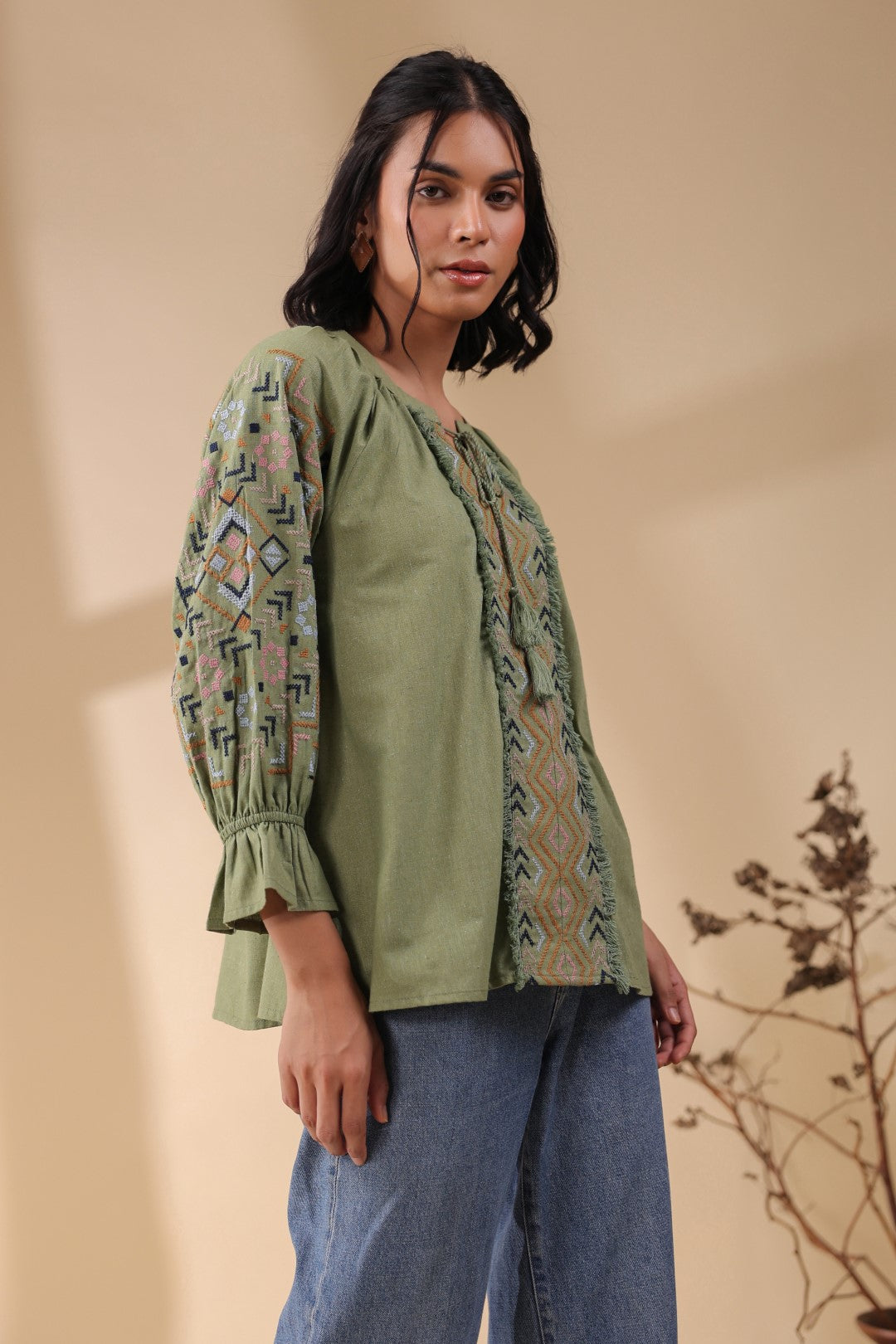 Women Green Cotton Flex Embroidered Top With Dori & Tassel